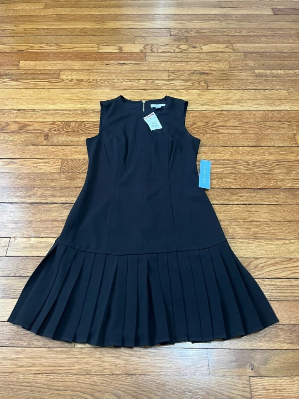 Sleeveless Black Pleated Hem Dress - (Brand: )